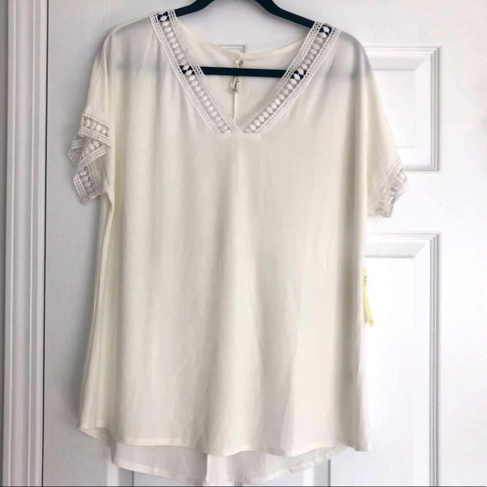 White tunic blouse with lace trim